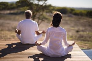 How can wellness retreats improve mental and physical health?